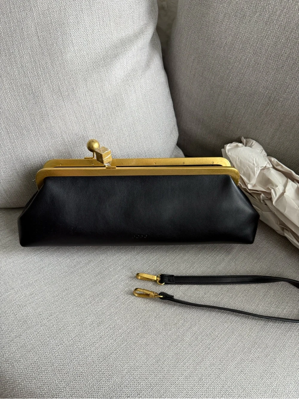 BCBG East West frame shoulder bag NWt black An asymmetric kiss-lock closure add